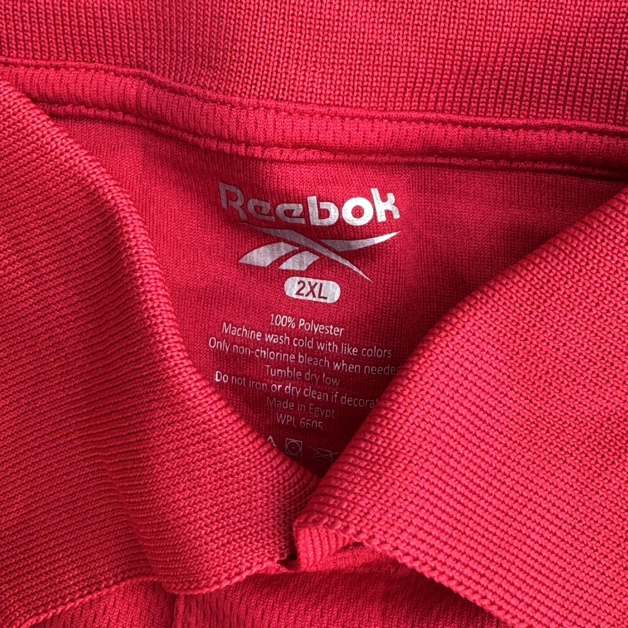Reebok red polo shirt