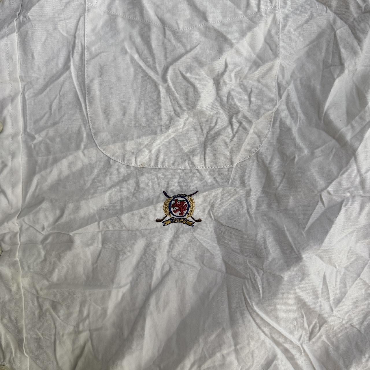 White Tommy Hilfiger golf button-up shirt