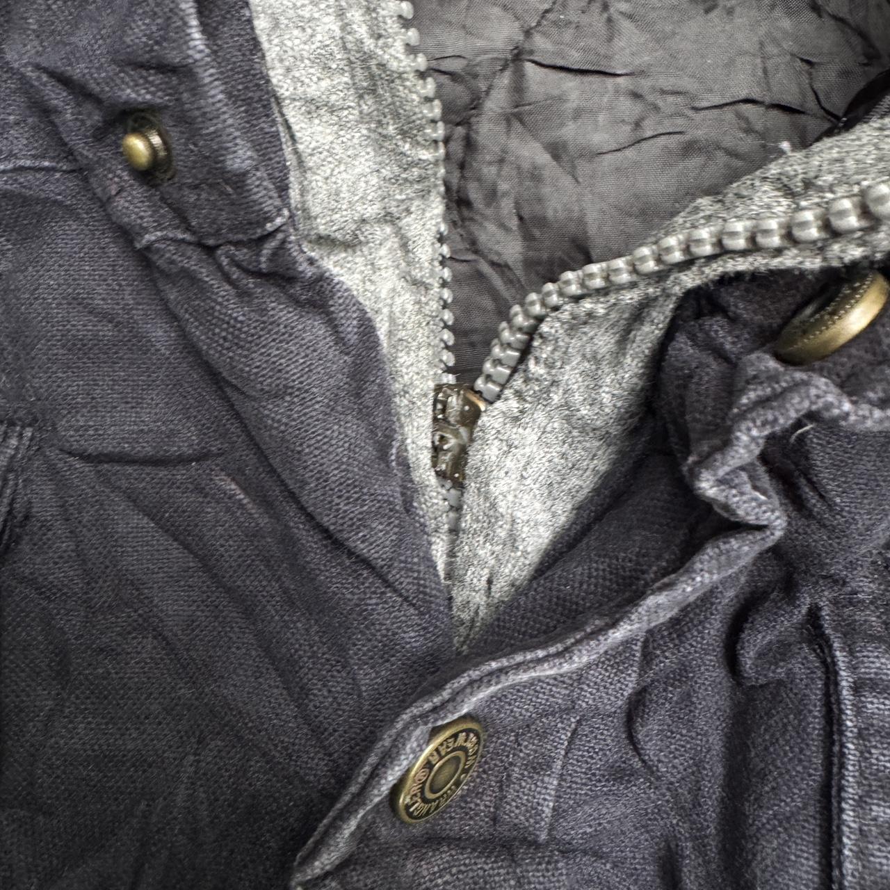 Black Wrangler jacket with a grunge vibe