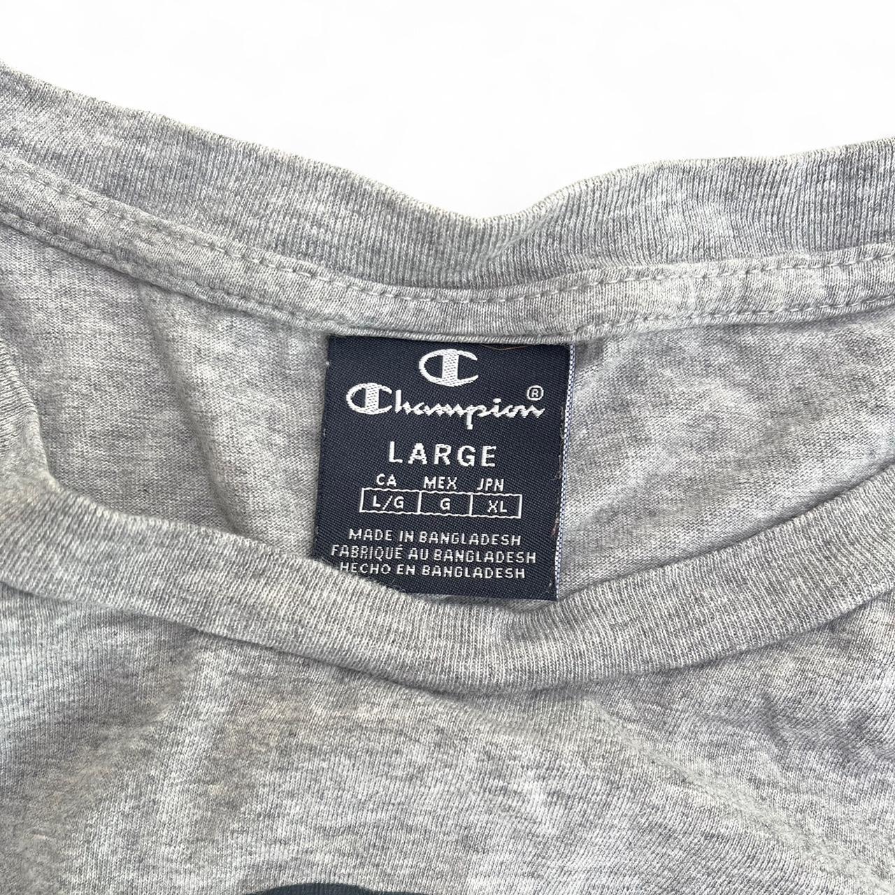 Grey long sleeved champion tee