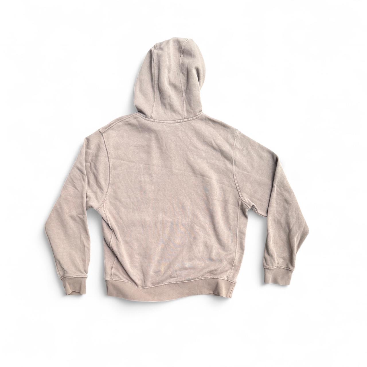 Light brown Nike hoodie with embroidered logo