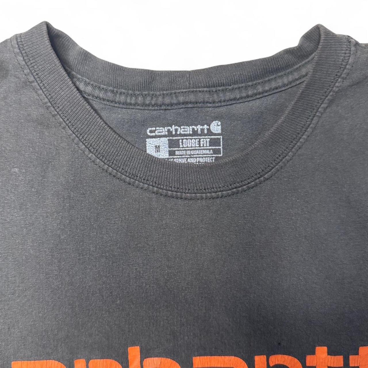 -olive carhartt tee with orange spellout