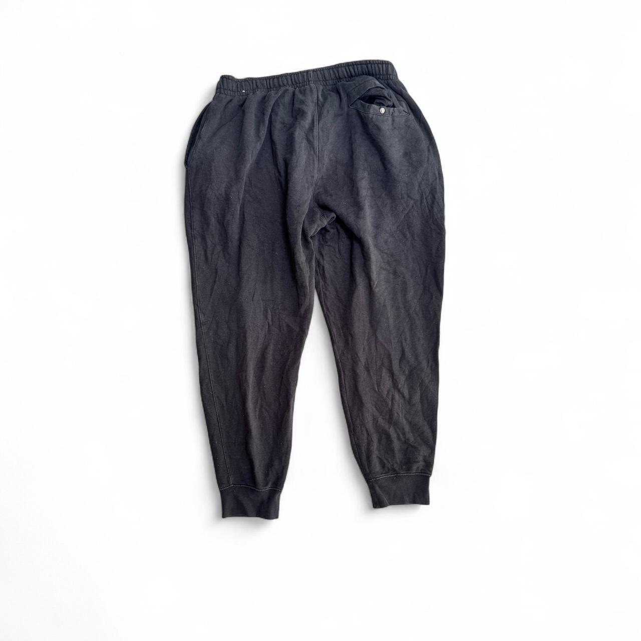 Nike black and blue tracksuit bottoms