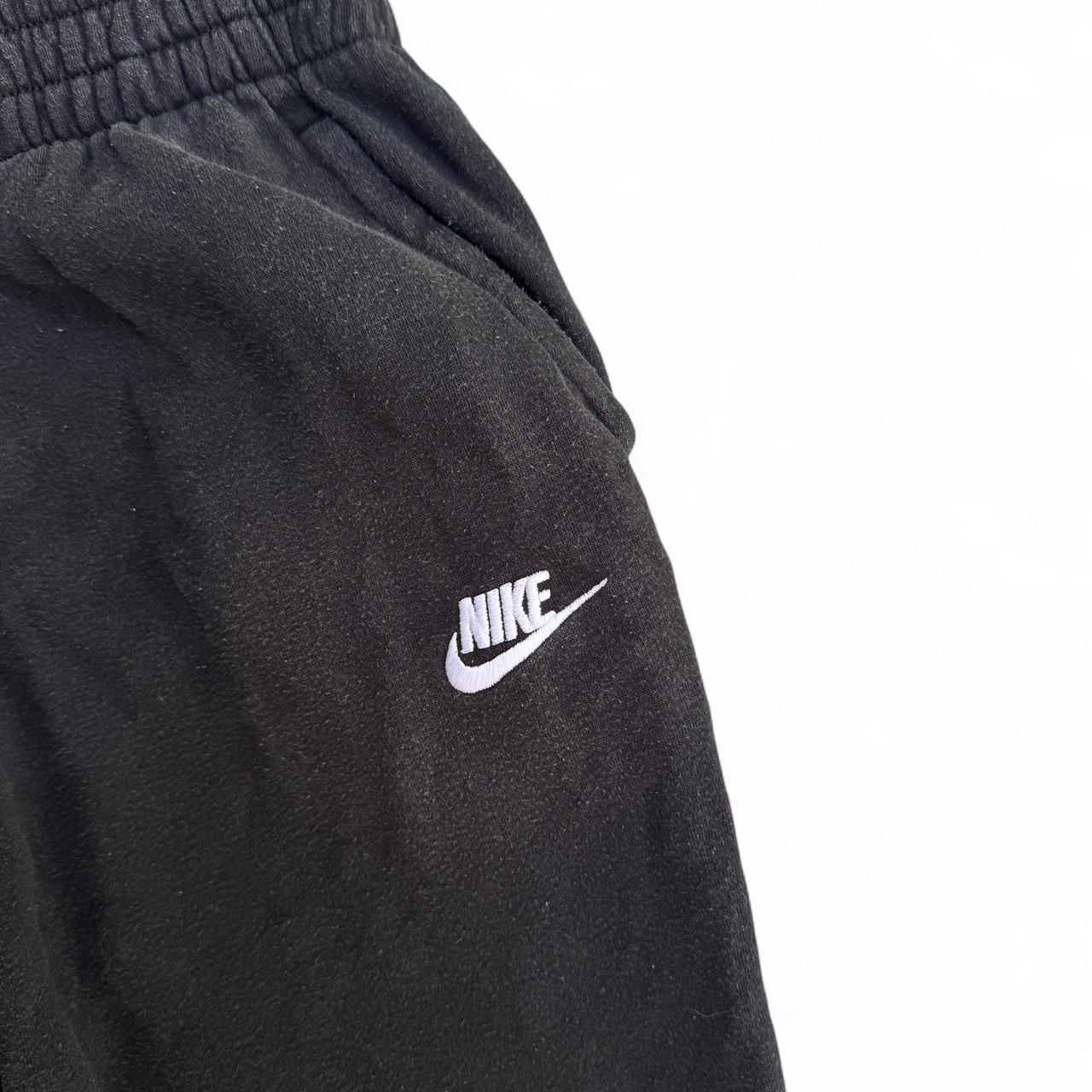 Black Nike sweatpants with embroidered logo