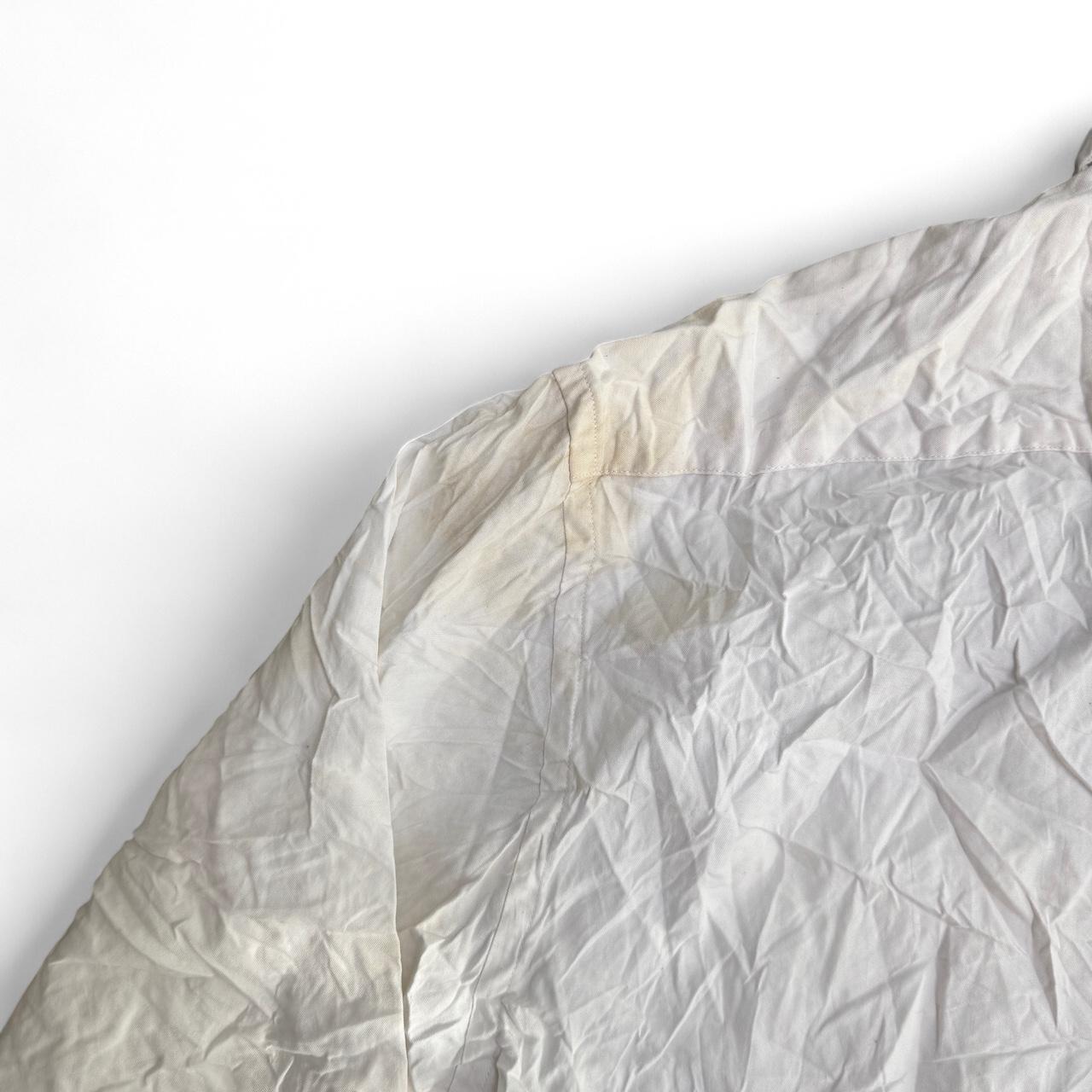 White Tommy Hilfiger golf button-up shirt