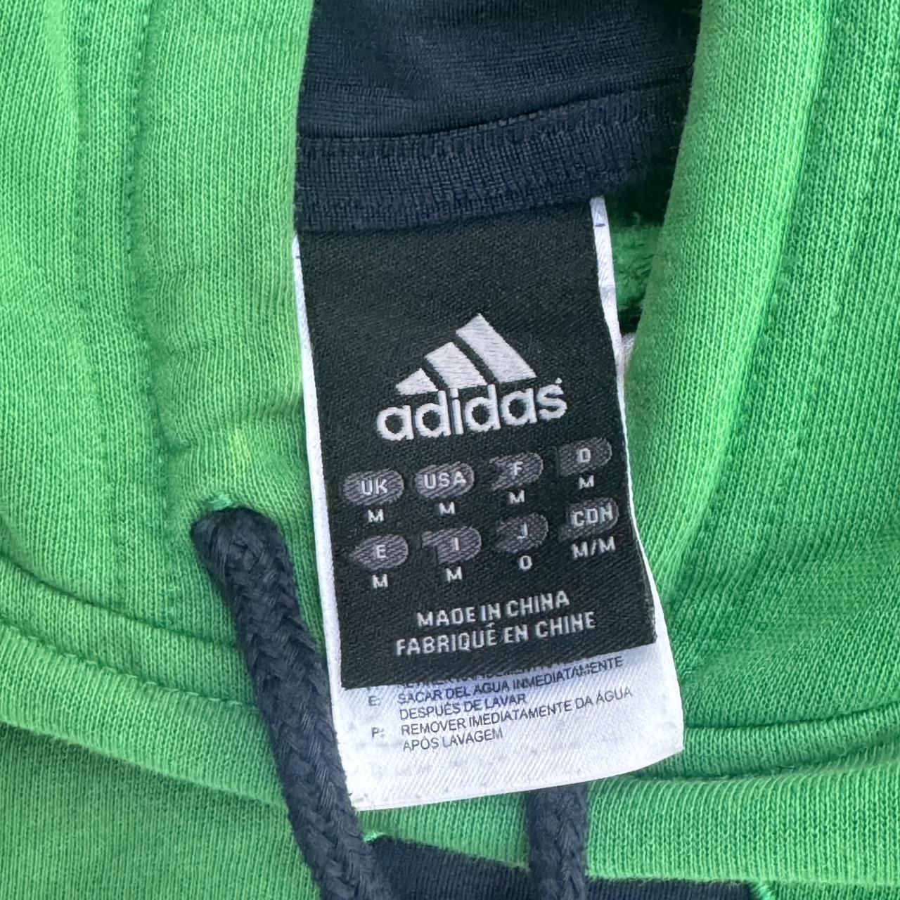 Green Adidas hoodie with a unique green and black logo adidas