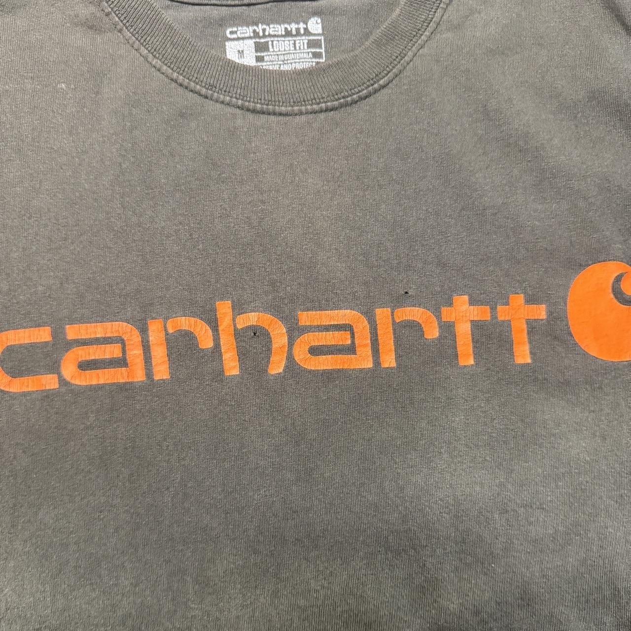 -olive carhartt tee with orange spellout
