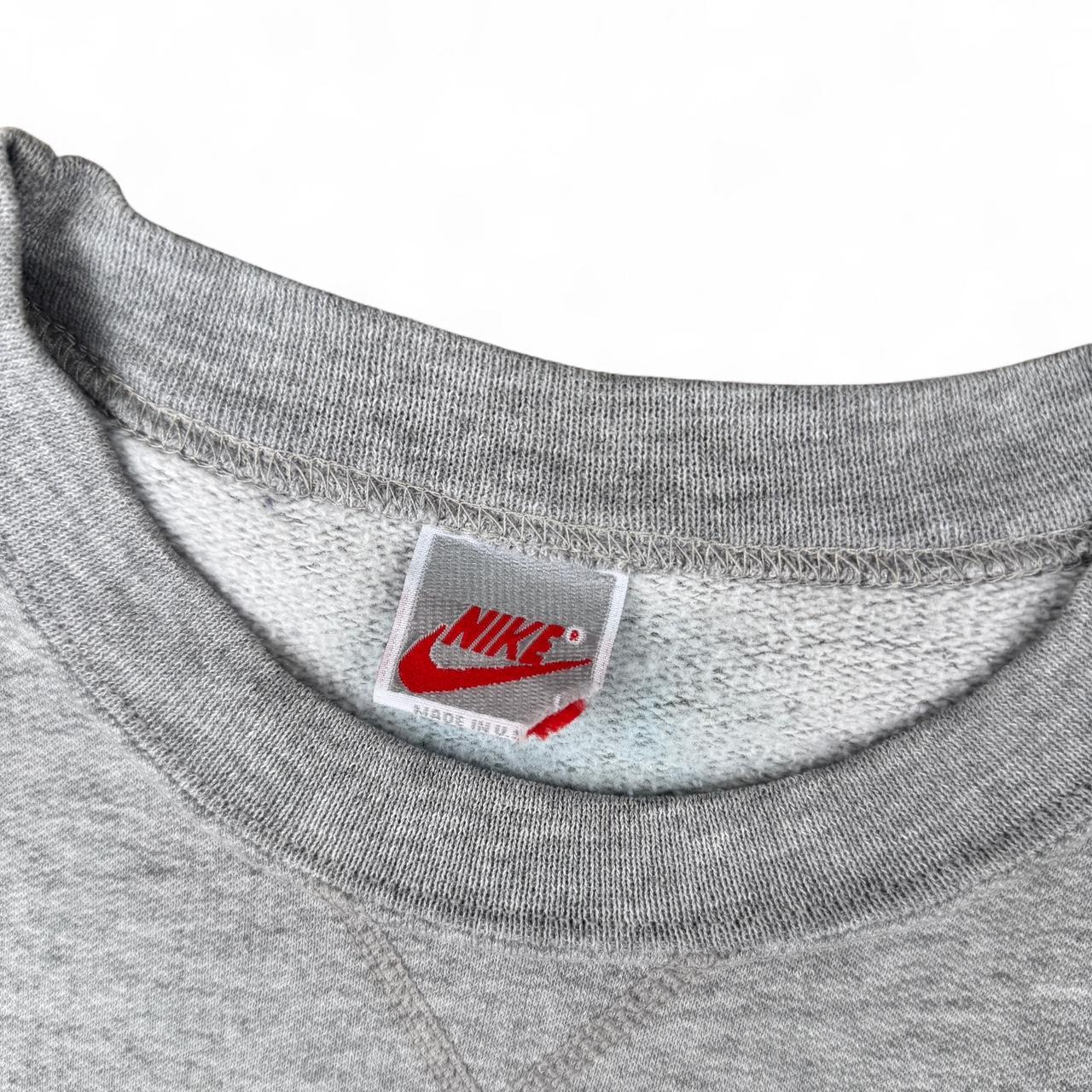 Grey Nike sweatshirt with embroidered logo
