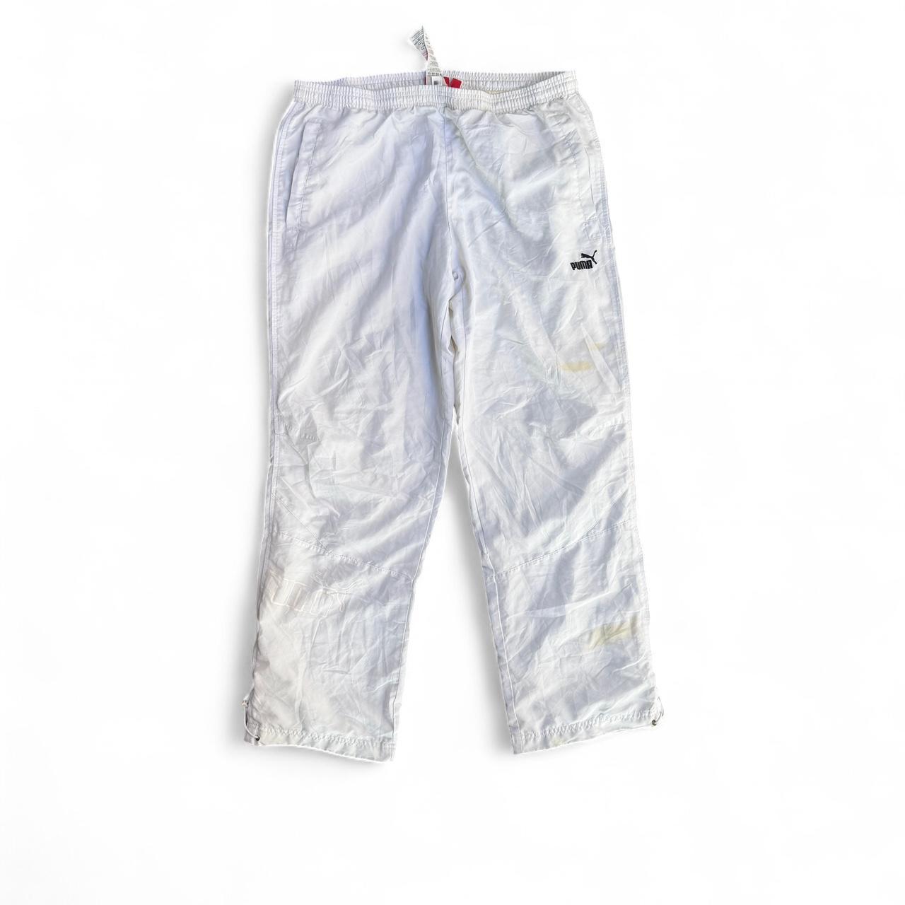 White Puma track pants with embroidered logo and drawstring waist