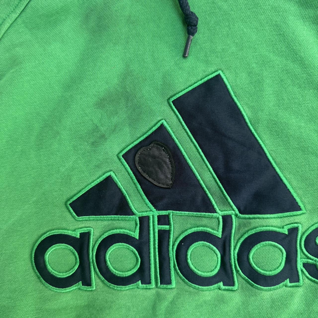 Green Adidas hoodie with a unique green and black logo adidas