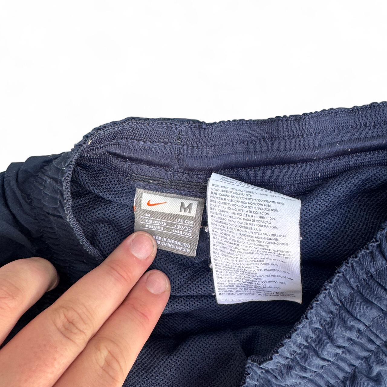 Navy Nike track pants with embroidered logo nike
