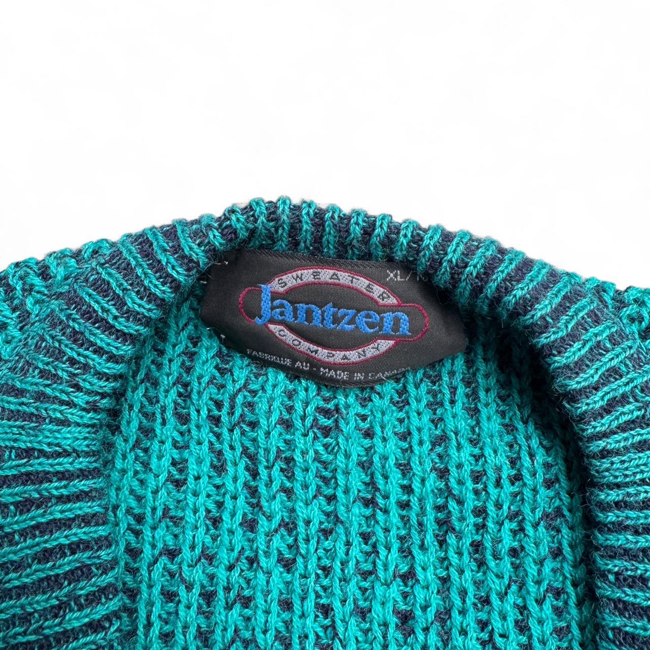Turquoise blue vintage 80s knit sweater with a V-neck and geometric pattern knitwear