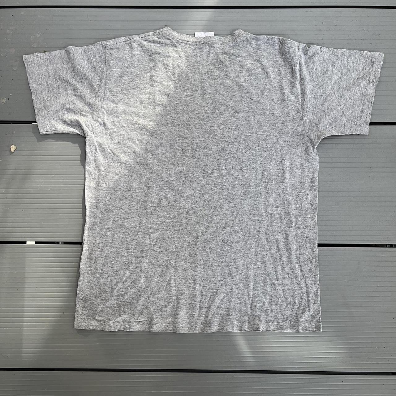 Grey Nike swoosh top