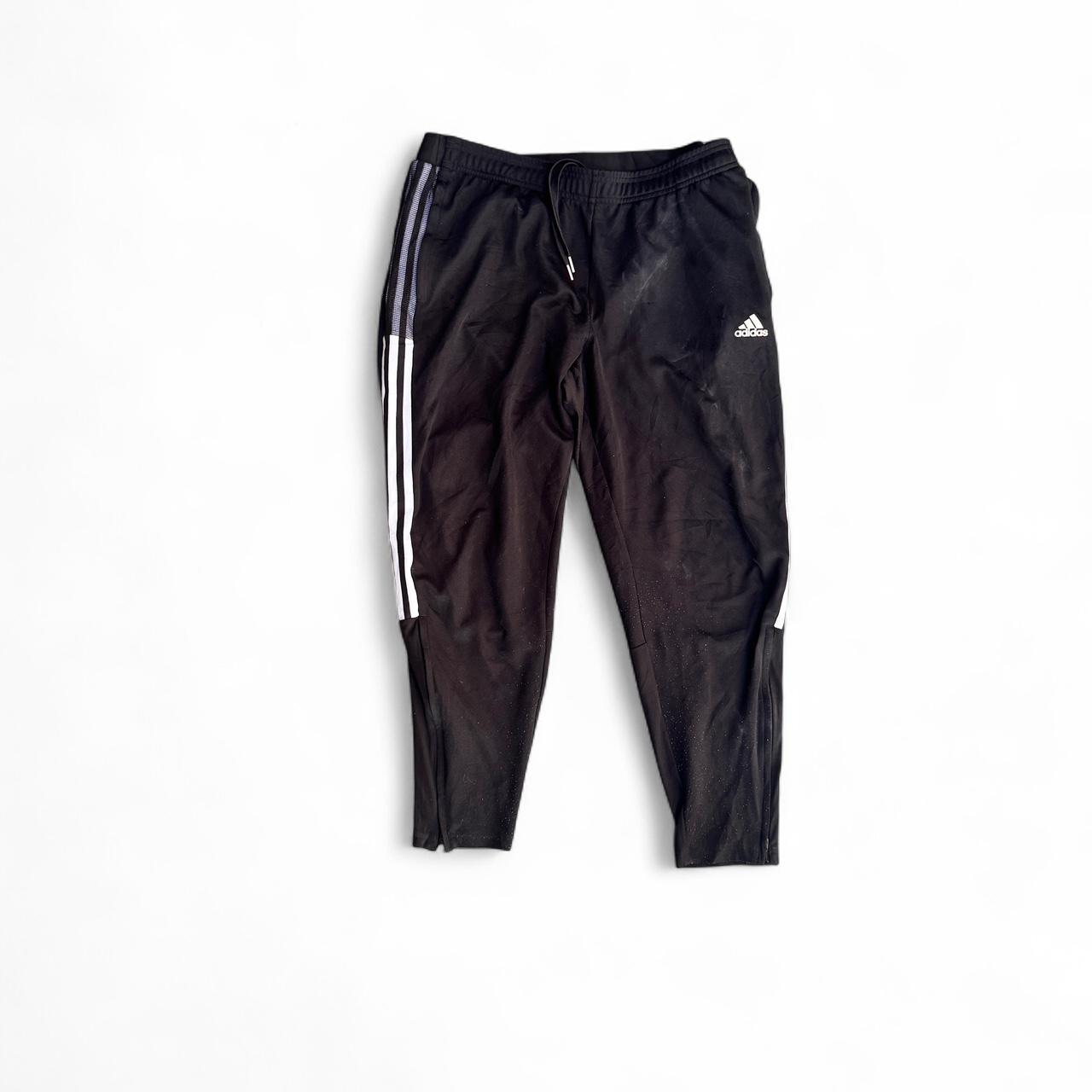 Black Adidas Primegreen joggers with white stripes