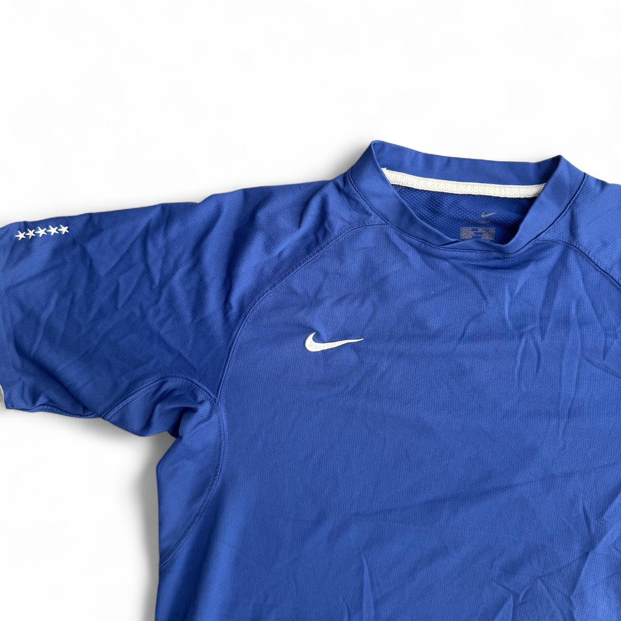 Nike blue and white sportswear top
