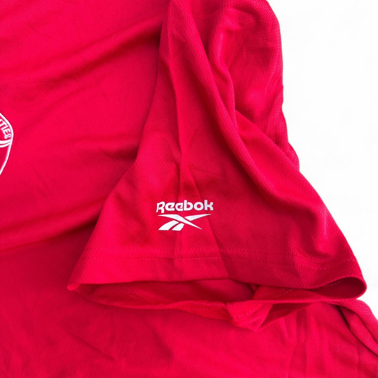Reebok red polo shirt