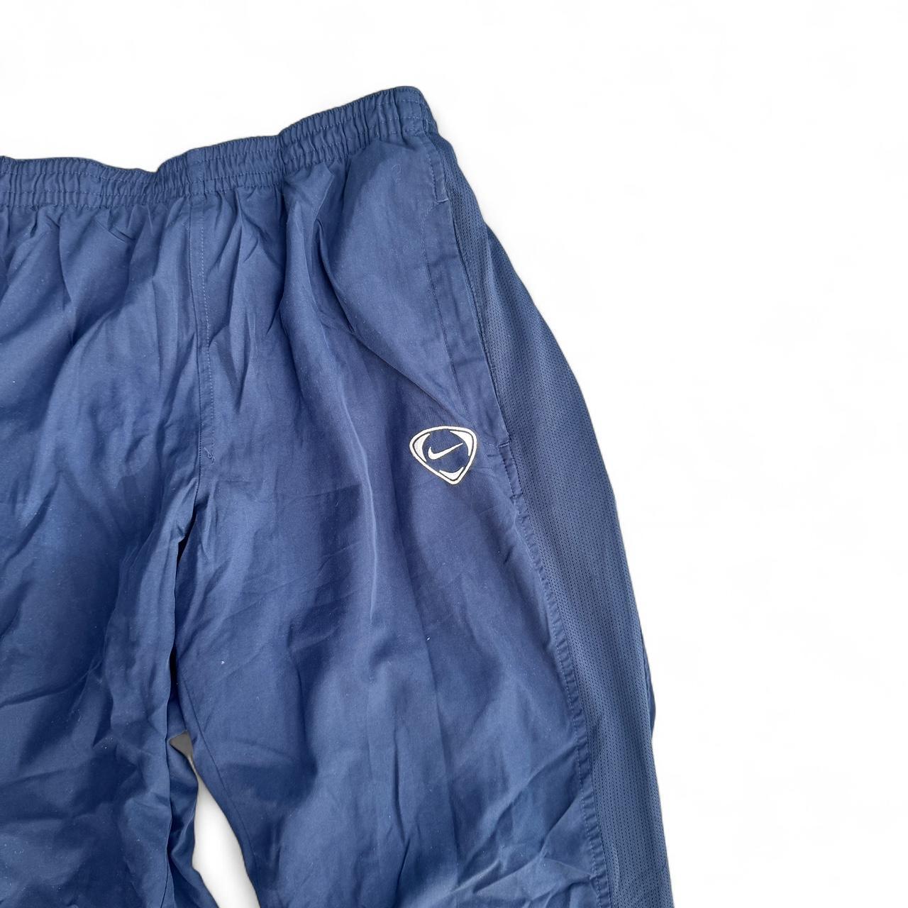 Navy Nike track pants with embroidered logo nike