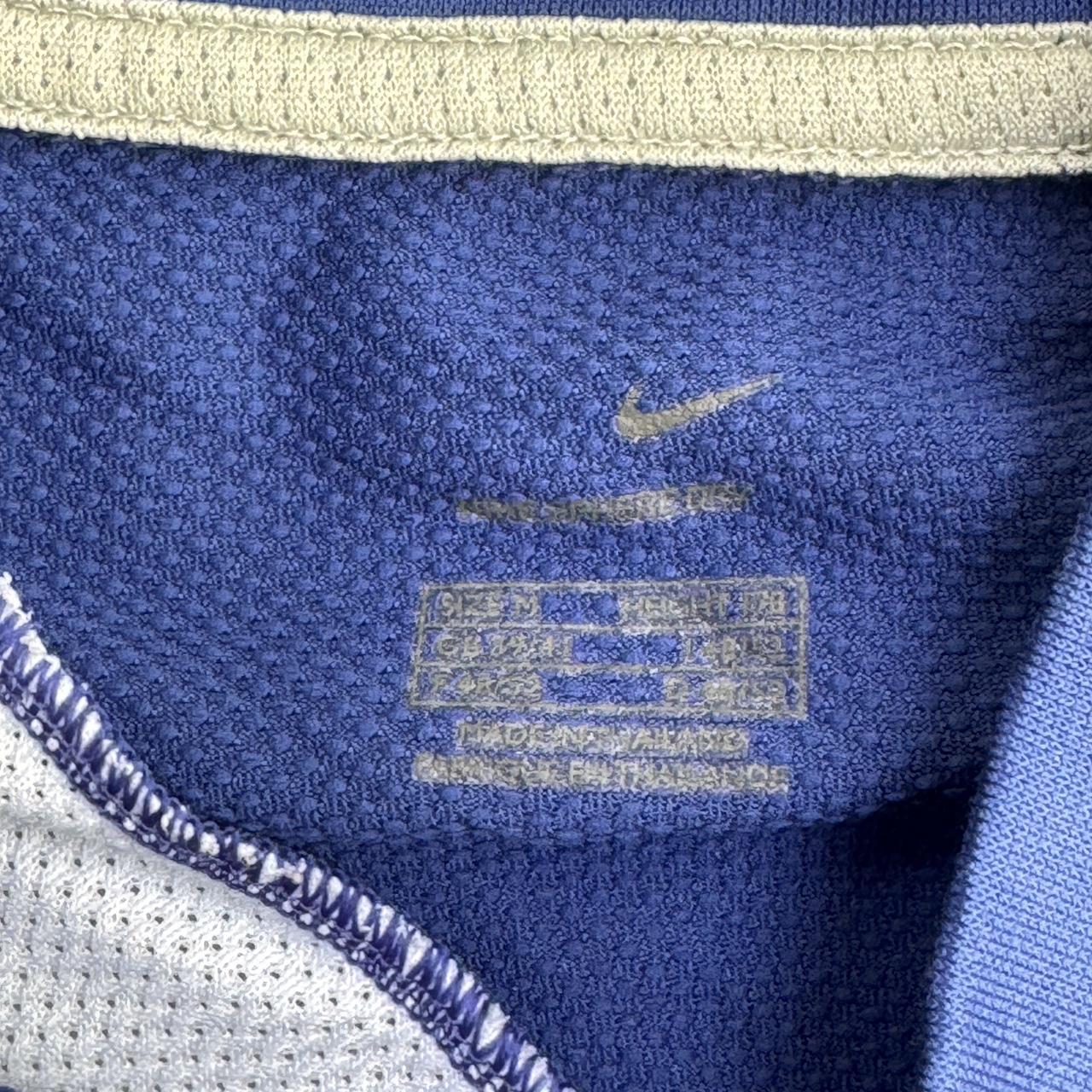 Nike blue and white sportswear top
