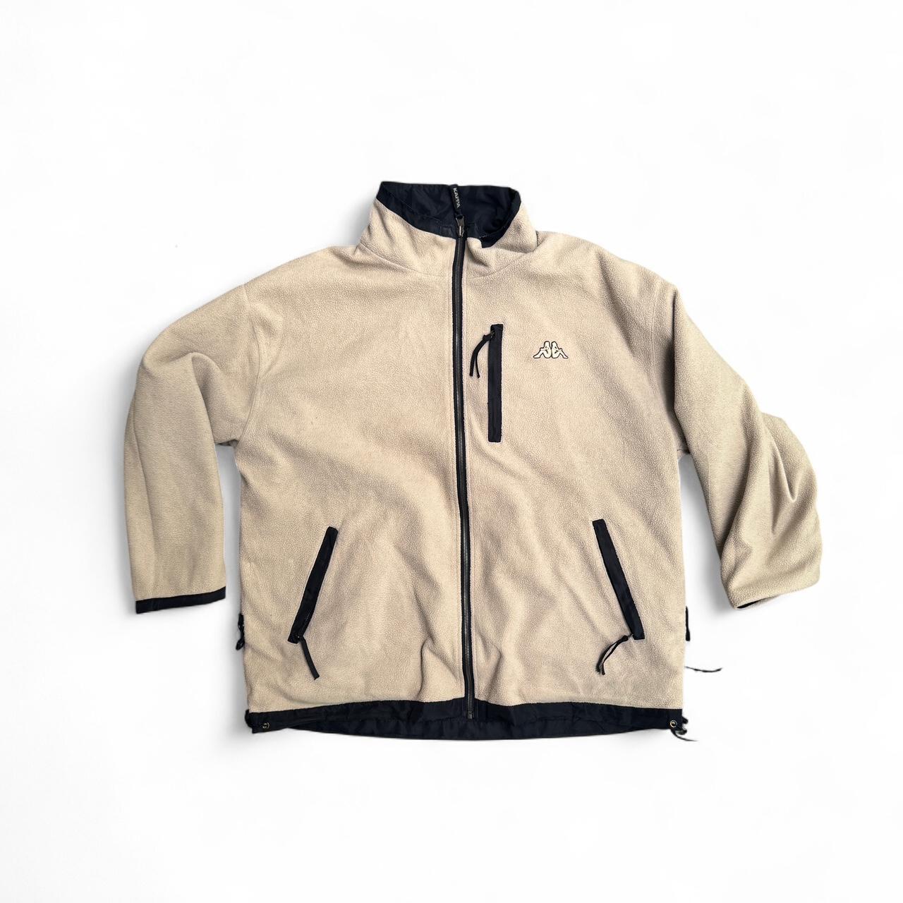 Black Kappa windbreaker jacket with white fleece lining which is reversible to a