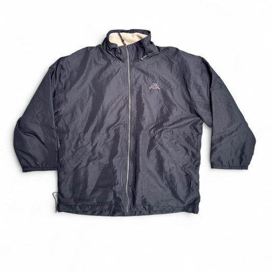 Black Kappa windbreaker jacket with white fleece lining which is reversible to a