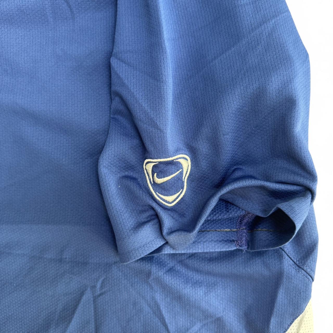 Nike blue and white sportswear top