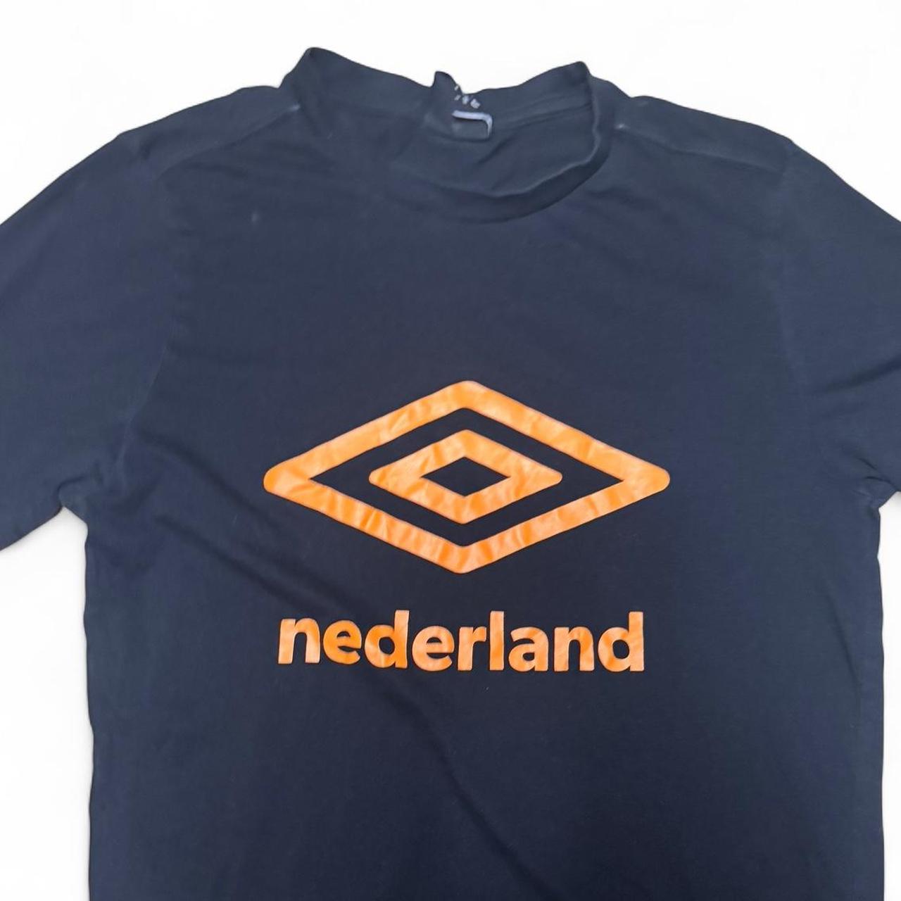 -black and orange Umbro Netherlands tee