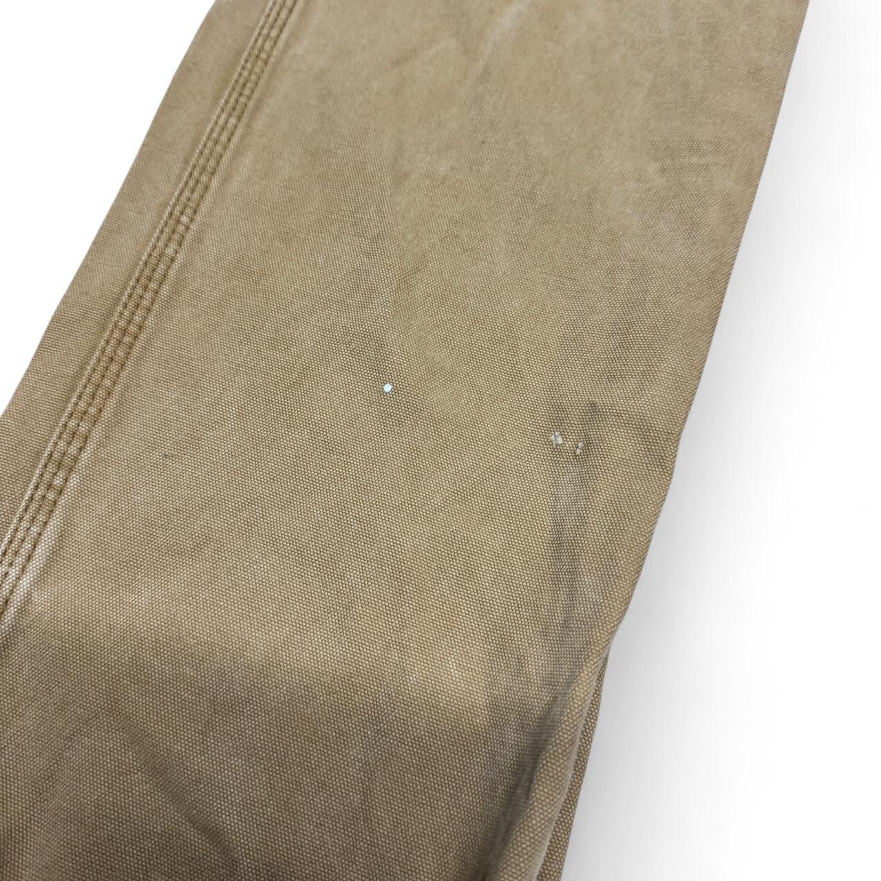 Tan Dickies carpenter pants in size 34x34