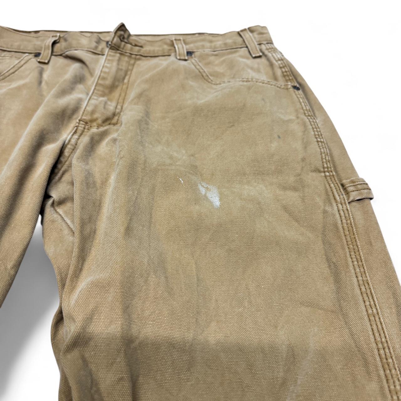 Tan Dickies carpenter pants in size 34x34