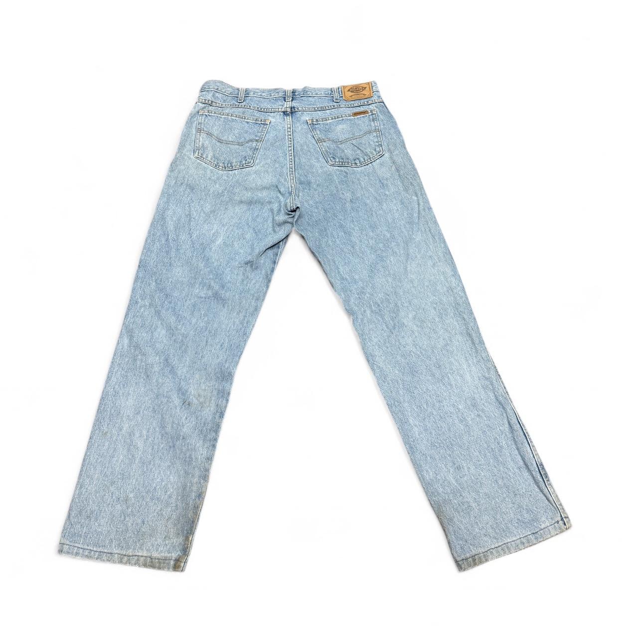 Blue Dickies jeans in size 36x34 with lots of marks and clear signs of wear