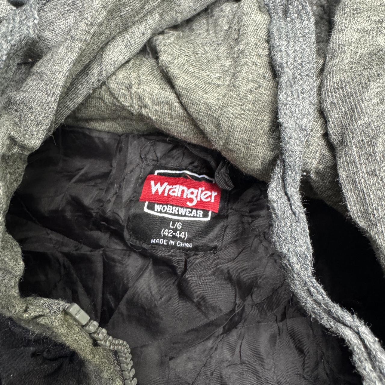 Black Wrangler jacket with a grunge vibe