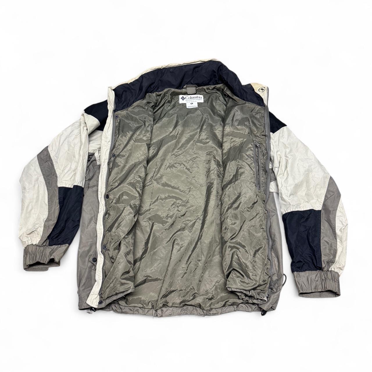 Columbia Sportswear windbreaker jacket in size XL with a couple of minor marks