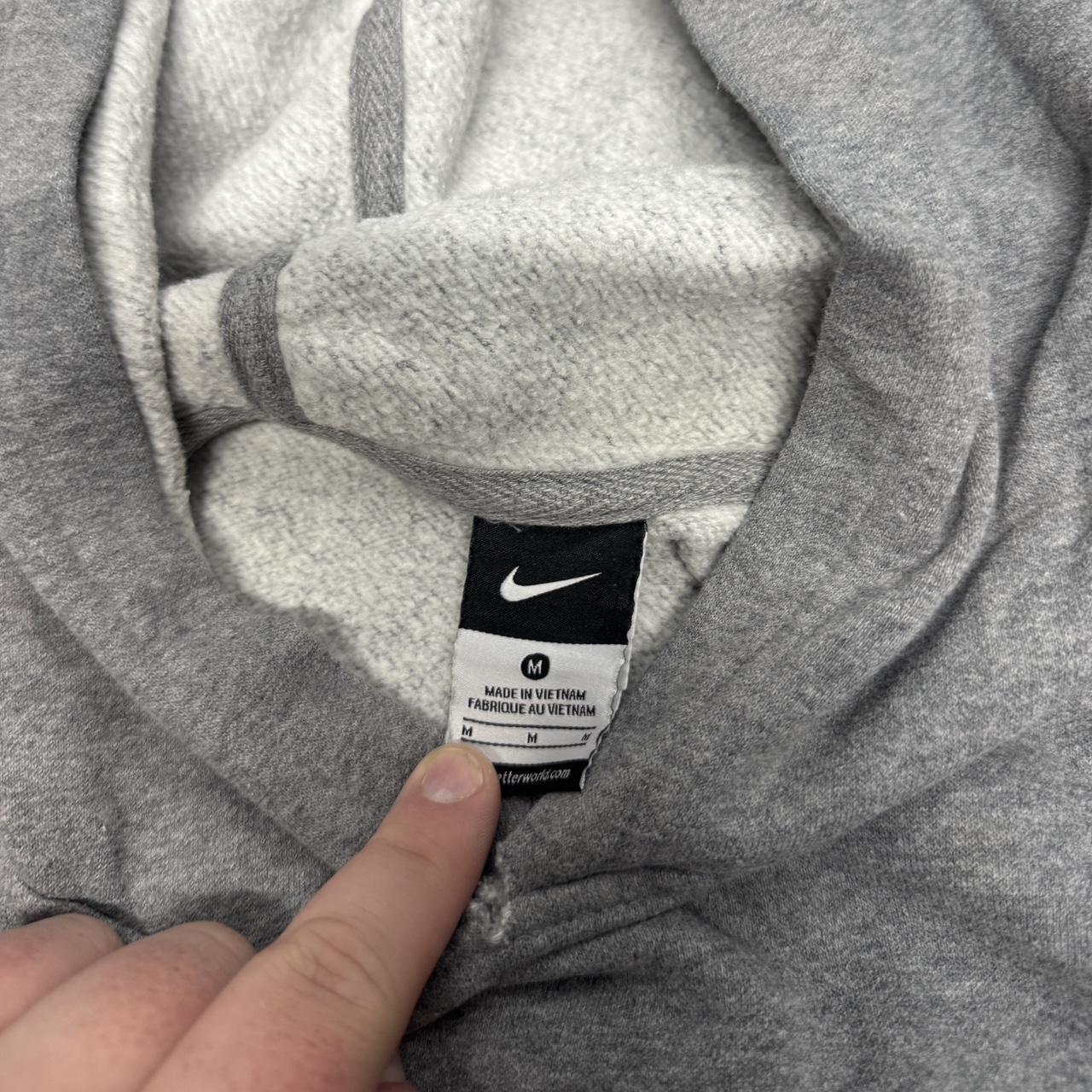 Grey Nike Harrison Lacrosse hoodie in size medium with a centre pocket and front swoosh logo
