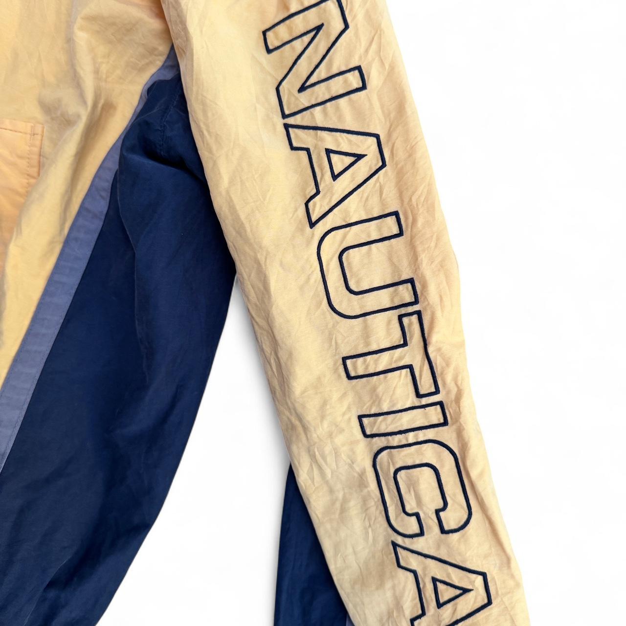 Yellow Nautica windbreaker with adjustable waist
