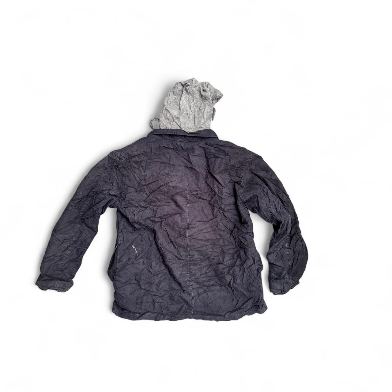 Black Wrangler jacket with a grunge vibe