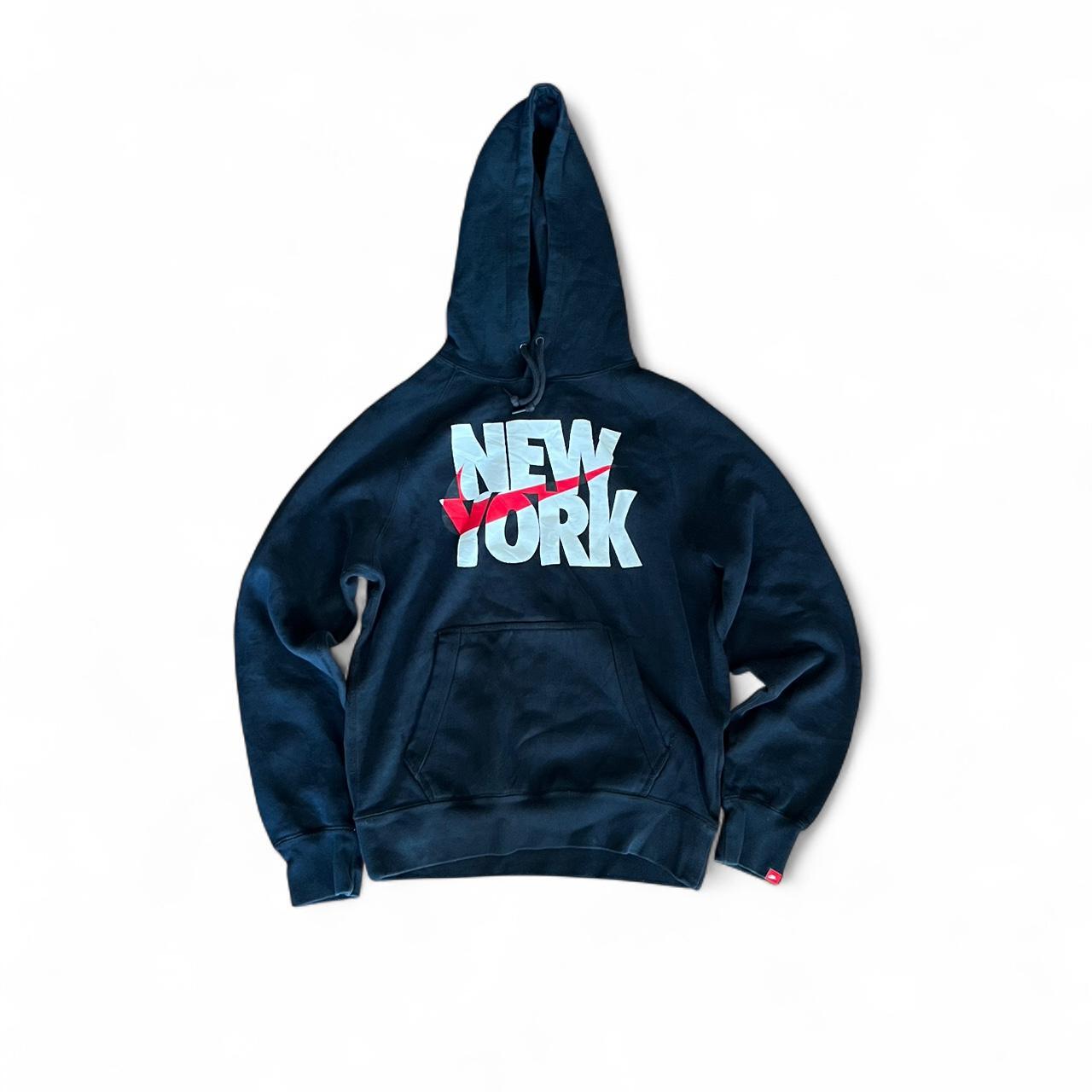 Black Nike hoodie in size Small featuring a bold New York graphic on the front