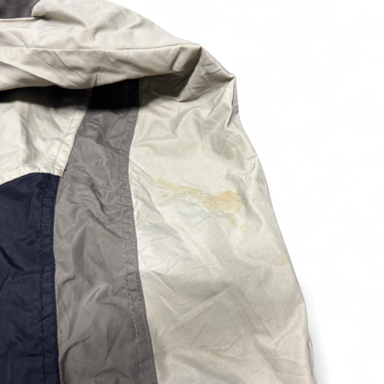 Columbia Sportswear windbreaker jacket in size XL with a couple of minor marks