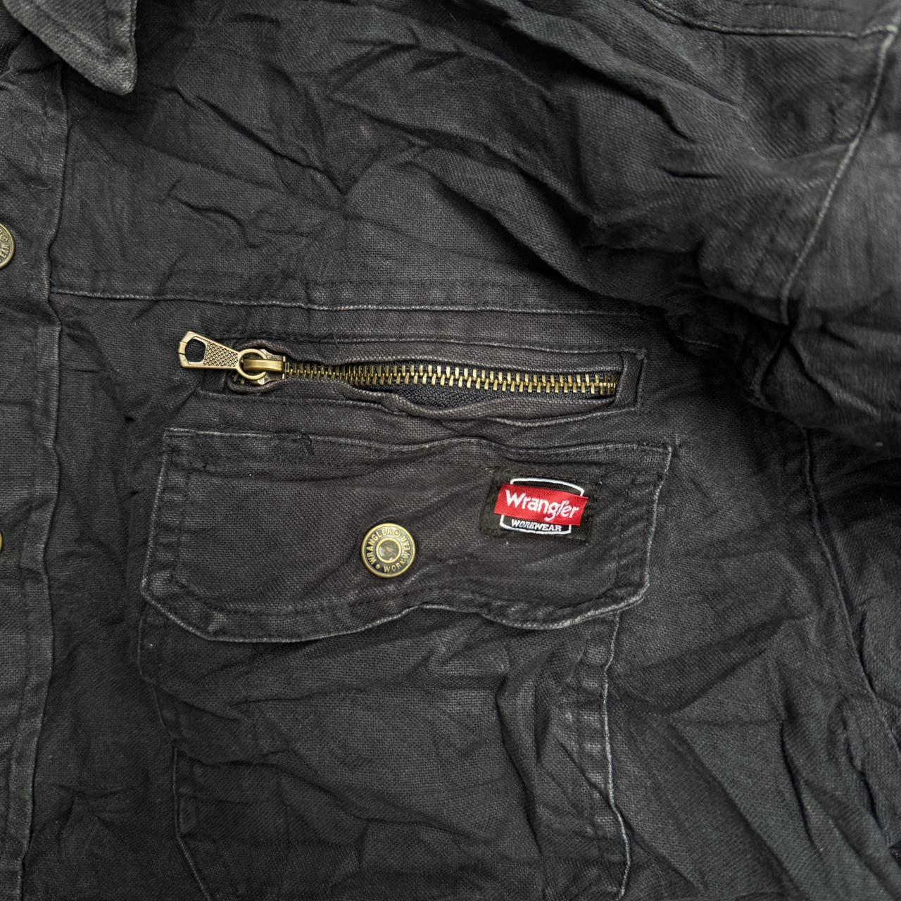 Black Wrangler jacket with a grunge vibe